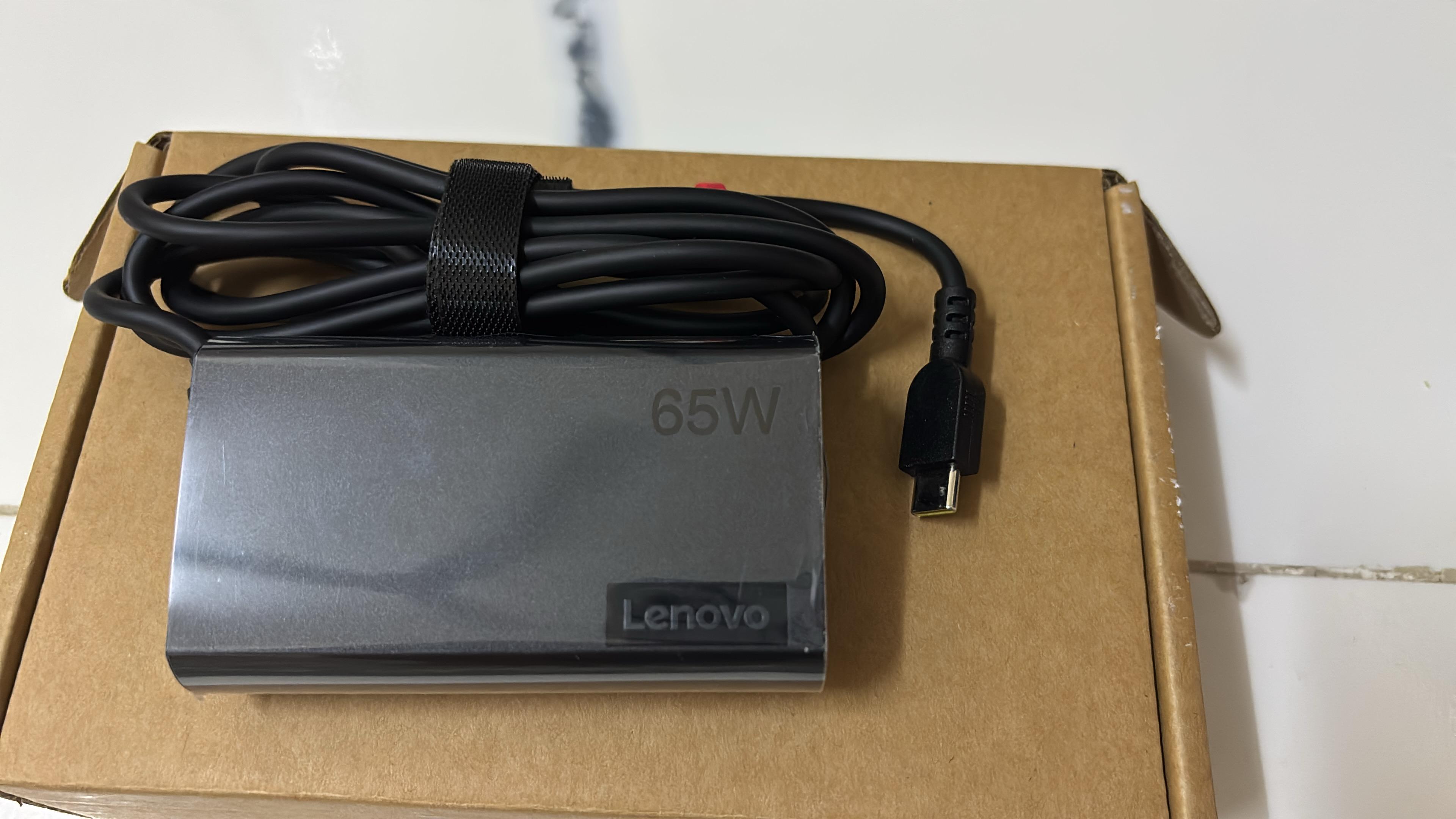 Lenovo P/N SA10R16901 is a Lenovo 65W USB-C AC power adapter.
